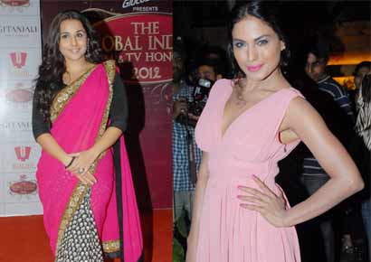 Veena Malik trying to do a Vidya Balan